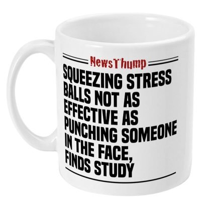 Squeezing Stress balls NewsThump headline mug